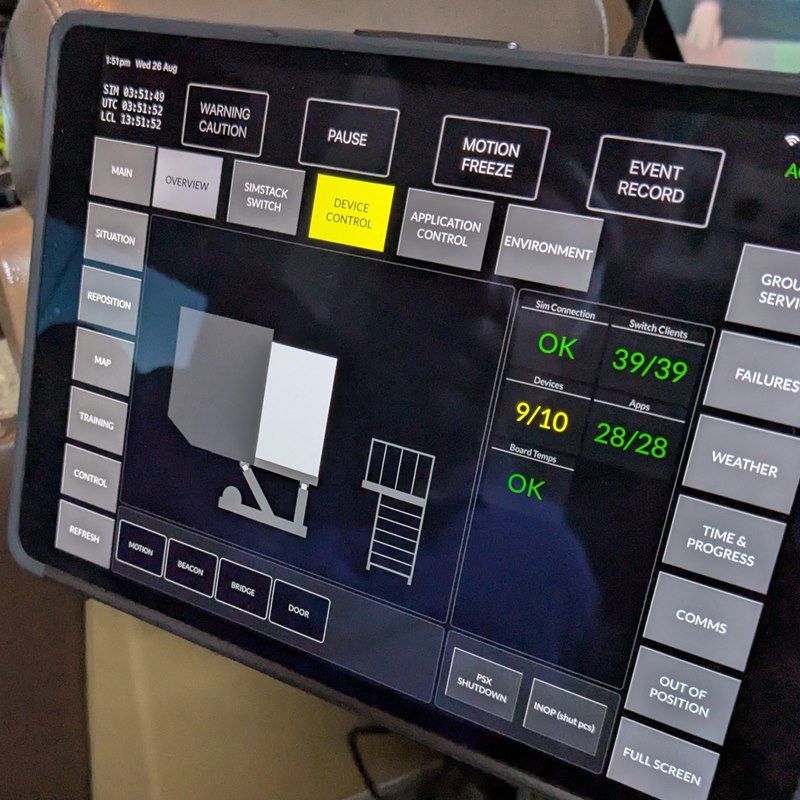 SimControl monitoring dashboard live in a simulator cockpit